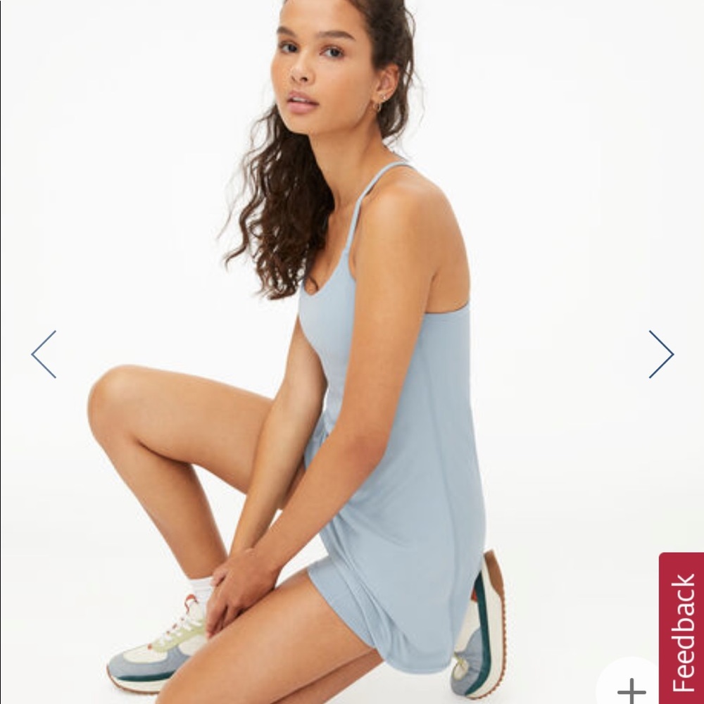 BLACK ACTIVE DRESS solid black color NOT in the blue as pictured. NEVER WORN